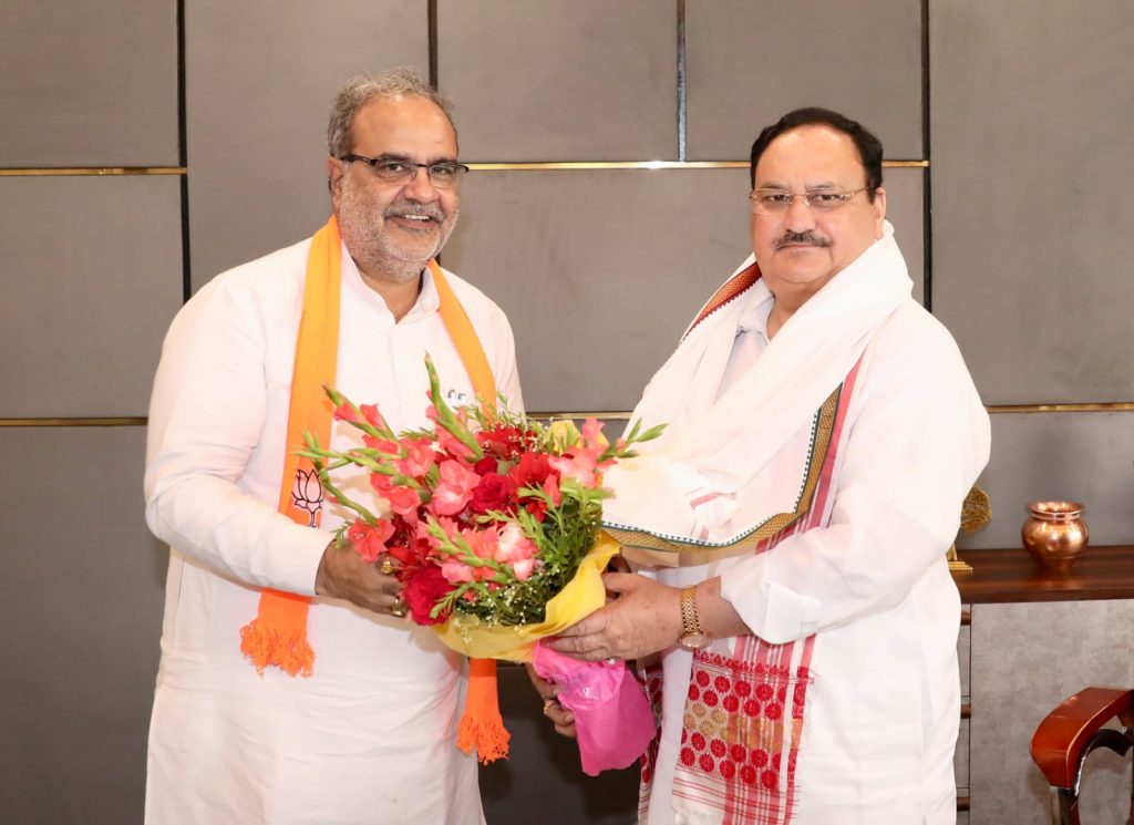 Bhupendra Singh Chaudhary with BJP chief JP Nadda
