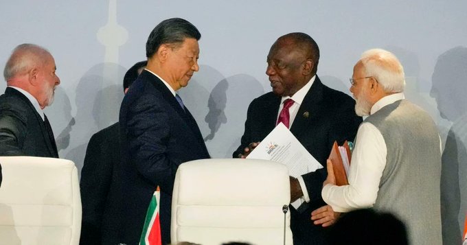 Chinese President Xi Jinping and PM Narendra Modi on the sidelines of BRICS Summit (photo credit X Chinese embassy in Sri Lanka)