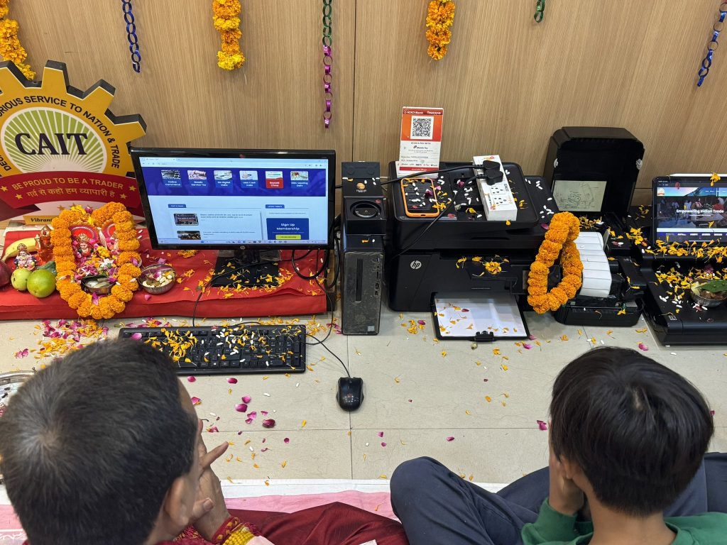 Traders offering prayers to electronic gadgets