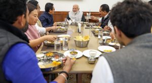 PM Narendra Modi taking lunch with MPs (Image credit X @narendramodi)