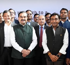 Gautam Adani with executives of Adani Renewables