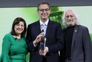 Pfizer CEO Albert Bourla receiving award