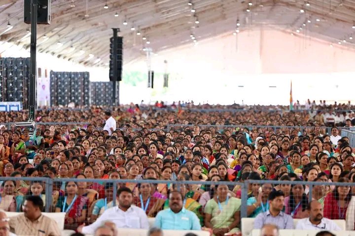 People attend a rally by Congress leader Rahul Gandhi