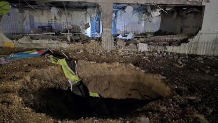 Crater created near a school after Iran fired missiles hit Israel on Tuesday night