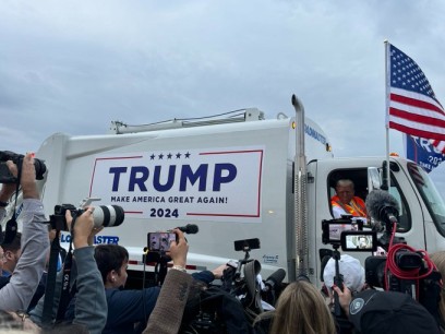 Donald Trump rides garbage truck on Wednesday