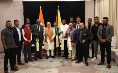 PM Narendra Modi with cricketers in Georgetown Image credit X.com @PMOIndia