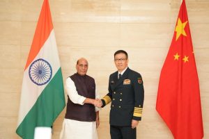 Union Minister for Defence Rajnath Singh with China's Dong Jun. Image credit PIB