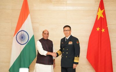 Union Minister for Defence Rajnath Singh with China's Dong Jun. Image credit PIB