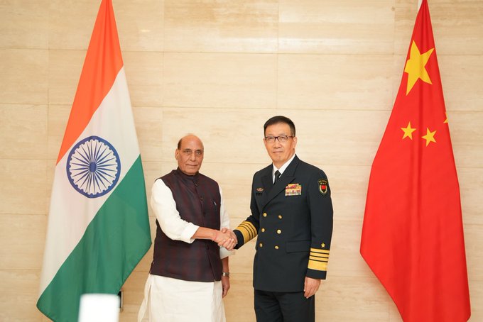 Union Minister for Defence Rajnath Singh with China's Dong Jun. Image credit PIB