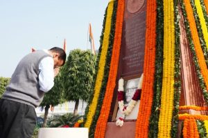 AAP Convenor Arvind Kejriwal at a statue of B R Ambedkar. Image credit X.com @AAPDelhi