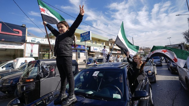 Syrian celebrating fall of Assad regime. Image credit X.com @Charles_Lister