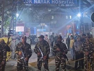 Security outside LNJP Hospital where injured were taken after the New Delhi Railway station stampede.