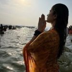 A woman pilgrim at Sangam for Mahakumbh on Tuesday.