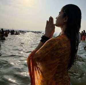 A woman pilgrim at Sangam for Mahakumbh on Tuesday.