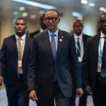 Rwanda President Paul Kagame arrives to speak at African Union Peace and Security Council with his delegation.