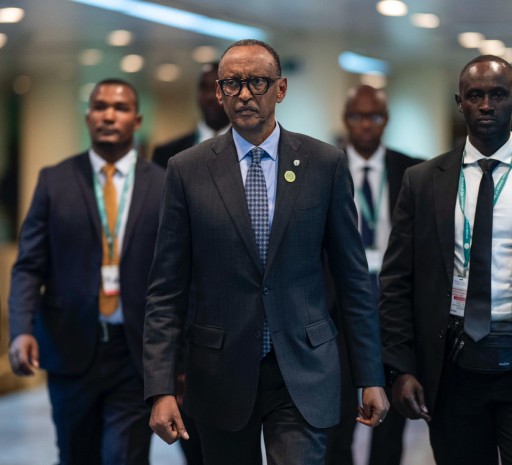 Rwanda President Paul Kagame arrives to speak at African Union Peace and Security Council with his delegation.