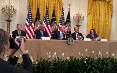 US President Donald Trump with health officials on Thursday.