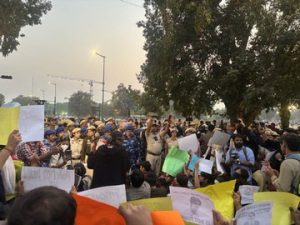 India Gate protests in New Delhi against air pollution crisis.