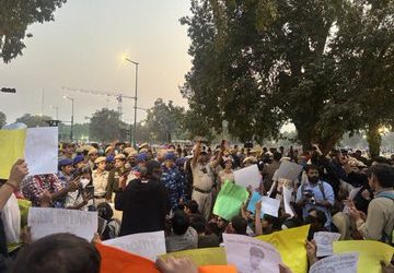 India Gate protests in New Delhi against air pollution crisis.