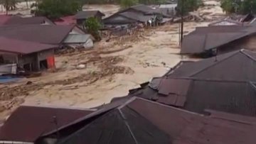Indonesia floods kill over 300 while several are still missing.
