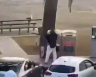 A bystander disarms a Bondi Beach attacker on Sundar.