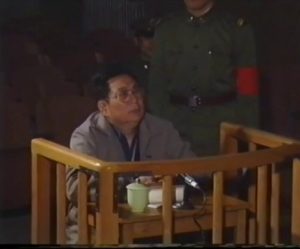Gen. Xu Qinxian during court martial hearing in a leaked video.