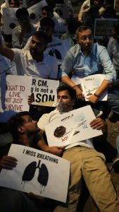 NSUI activists protest against air pollution in Delhi.