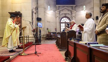 Prime Minister Narendra Modi takes part in the Christmas morning service at The Cathedral Church of the Redemption.