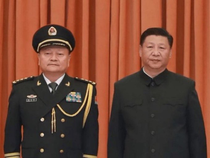 Chinese President Xi Jinping with arrested CMC deputy chief Zhang Youxia.