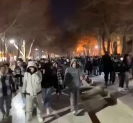 Iranians hold massive protests in Tehran.