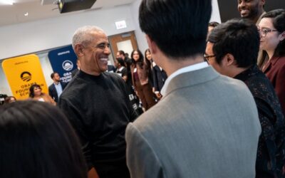 Former US President Barack Obama with supporters.