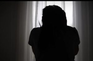 A sex worker on GB Road Street.