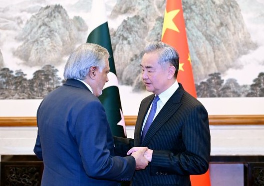 China FM Wang Yi met with Pakistani Deputy Prime Minister and Foreign Minister Mohammad Ishaq Dar in Beijing on Tuesday.