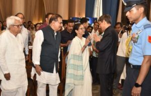 West Bengal CM Mamata Banerjee greets R. N. Ravi as he is sworn in as the Governor.