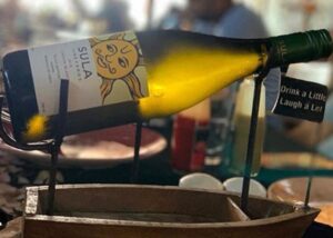 Sula Wines on a miniature wooden boat.