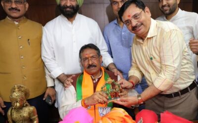 Delhi BJP leader Harsh Malhotra receiving congratulations from party members and supporters after being appointed the new Delhi BJP chief.
