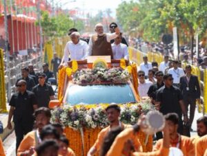 Prime Minister Narendra Modi during a roadshow in Guwahati on Tuesday.