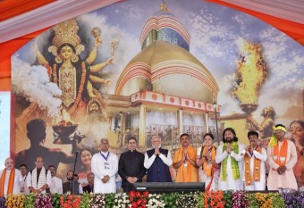 Prime Minister Narendra Modi with new West Bengal CM and Ministers in Kolkata on Saturday.