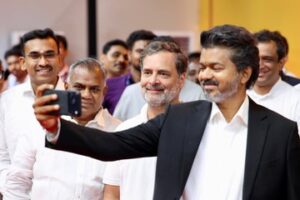 Tamil Nadu Chief Minister Vijay takes a selfie with Congress leader Rahul Gandhi.