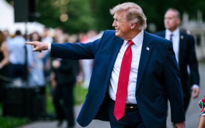 U.S. President Donald Trump speaking during a public address, discussing Iran, energy markets and U.S. economic performance.