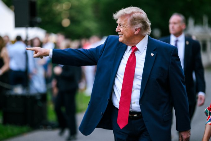 U.S. President Donald Trump speaking during a public address, discussing Iran, energy markets and U.S. economic performance.