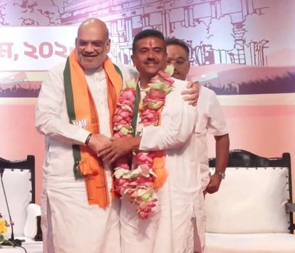 Union Home Minister Amit Shah Congratulates Suvendu Adhikari after his election as BJP legislative party leader in Kolkata.