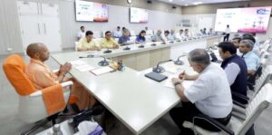Uttar Pradesh Chief Minister Yogi Adityanath chairs a review meeting with energy department officials on electricity supply during the summer season.