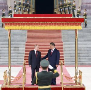 Vladimir Putin and Xi Jinping meeting in Beijing during state visit symbolizing China-Russia strategic partnership.
