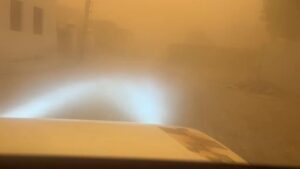 A massive black-and-yellow dust storm swept across Rajasthan’s Churu district on Saturday, engulfing the area in dense clouds of sand and reducing visibility to near zero.