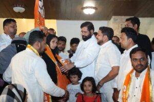 Maharashtra deputy CM Eknath Shinde with supporters in Mumbai.