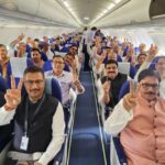 Passengers inside the terminal of Noida International Airport on opening day as IndiGo operates the first commercial flights from Jewar Airport.