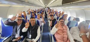 Passengers inside the terminal of Noida International Airport on opening day as IndiGo operates the first commercial flights from Jewar Airport.