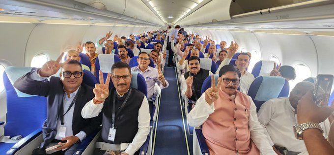 Passengers inside the terminal of Noida International Airport on opening day as IndiGo operates the first commercial flights from Jewar Airport.