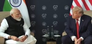 US President Donald Trump and Prime Minister Narendra Modi share a light moment during their meeting in France amid India-US trade negotiations.